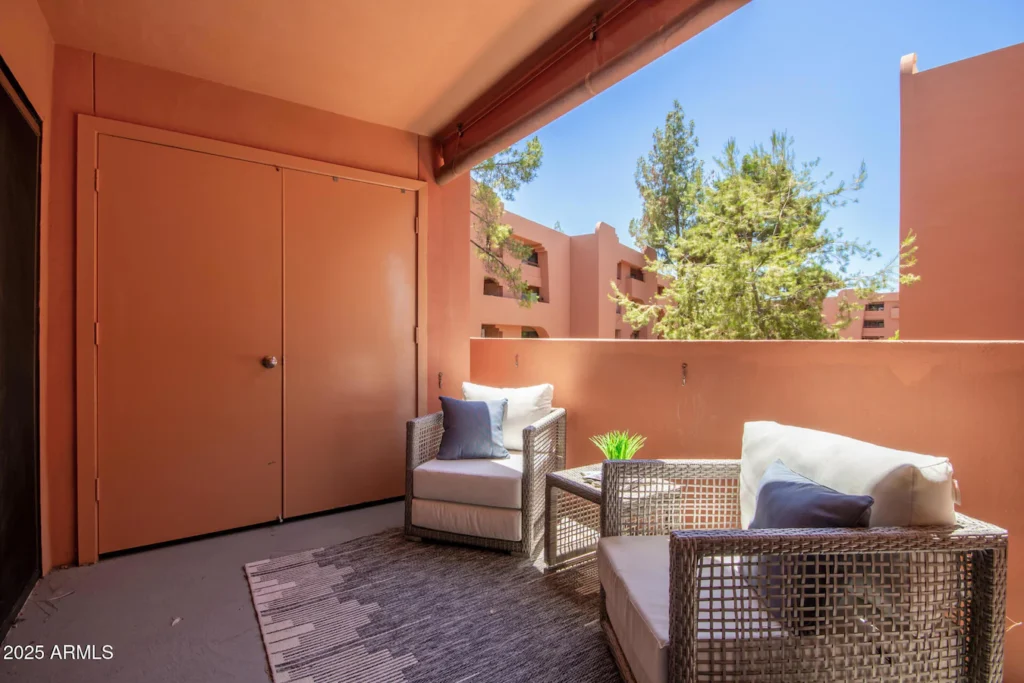 Balcony seating area in house sold as-is for cash